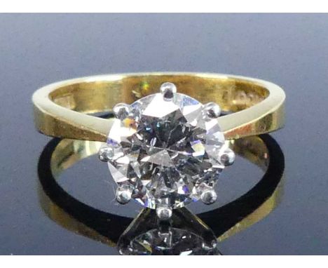 A 22ct yellow gold diamond solitaire ring, featuring a round brilliant cut diamond in a white eight-claw setting, diamond dim