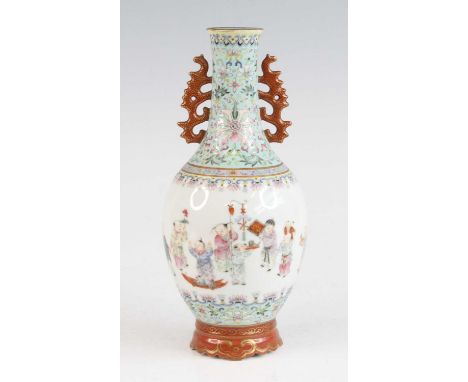 A Chinese famille rose porcelain vase, enamel decorated with children and lotus flowers, apocryphal red Qianlong zhuanshu sea