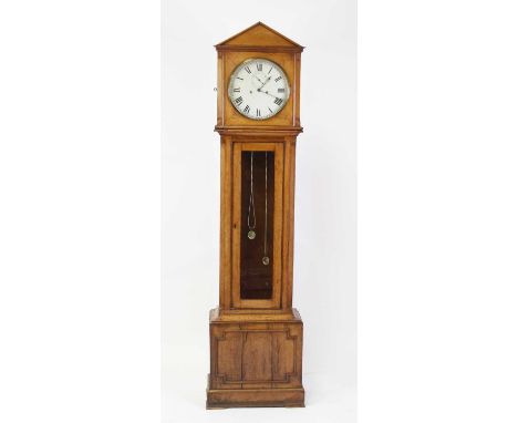 An early Victorian oak longcase regulator, having an unsigned circular white enamel Roman 12" dial, subsidiary seconds dial, 