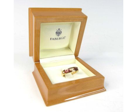 An 18ct yellow gold Fabergé enamel and diamond ring, comprising three 2.25mm round brilliant cut diamonds in flush settings w
