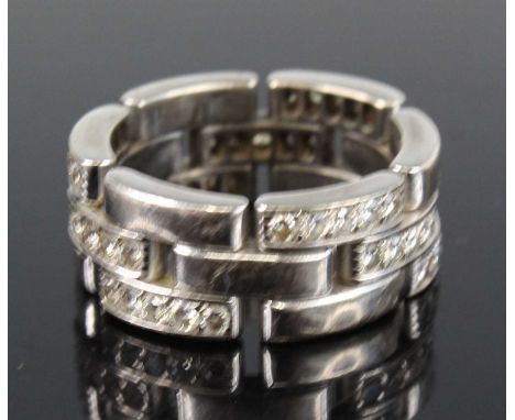A Cartier 18ct white gold and diamond Maillon Panthere diamond ring arranged as three alternating rows, one set with five bri