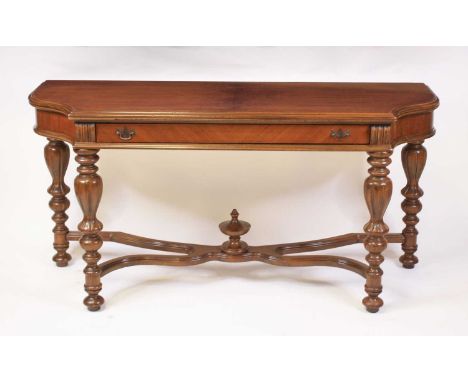 An American walnut combination hall dining table by H. Herrmann of New York, having a fold-over top above a single frieze dra