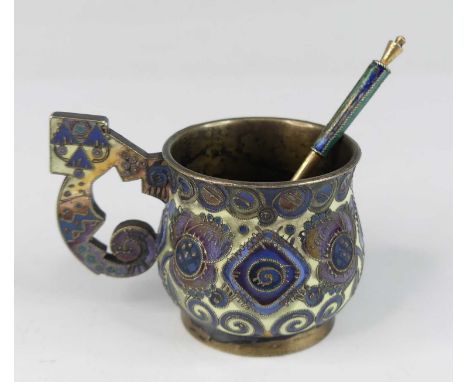 An early 20th century single handled Russian silver and cloisonne enamelled cup, of lower baluster form to a raised foot, hav