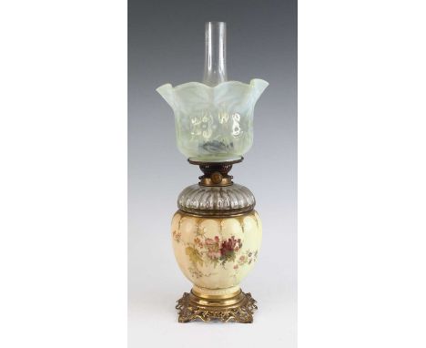 A Royal Worcester oil lamp, circa 1893, the vaseline glass shade above a clear glass font, the blush ivory base shape 1403, d