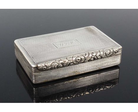 A William IV silver pocket snuff box, of rectangular form, with proud leaf and flower chased thumbpiece, all-over engine turn