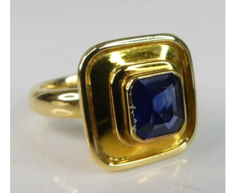 An 18ct yellow gold sapphire heavy dress ring, featuring an octagonal cut sapphire bezel set within a 17mm head, sapphire dim