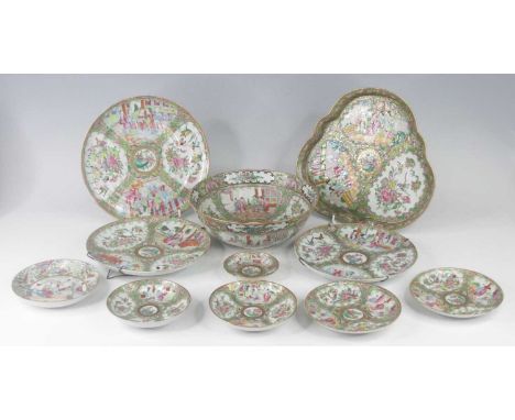 A collection of Chinese Canton porcelain dinnerwares, 19th century, each enamel decorated with interior scenes within cartouc