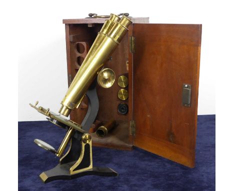 A late Victorian lacquered brass binocular microscope by H &amp; W Crouch of Regent's Canal Dock, London, numbered 12, in fit