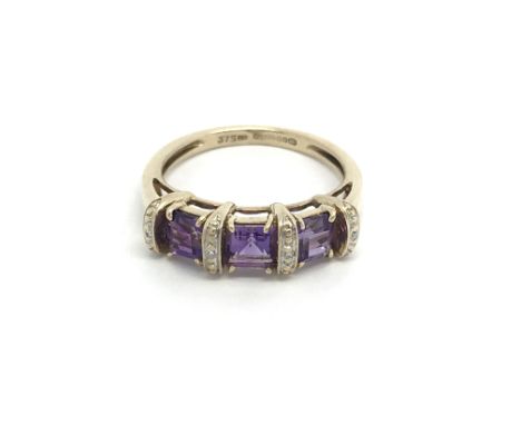 A 9ct white gold amethyst and diamond ring, (M.5), 2.6g.