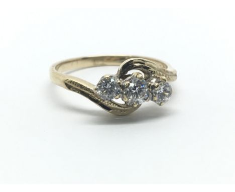 An 18ct yellow gold and CZ ring, ring size approx L/M