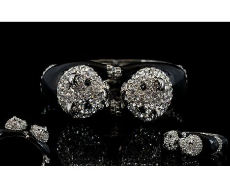 White Crystal and Black Enamel Double Panda Bangle, a hinged bangle, opening where the two crystal and enamel pandas face eac
