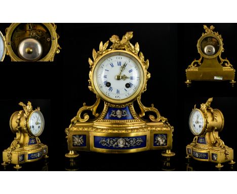 Vincenti & Cie 1822-1910 Gilt Bronze Mantle Clock Circa 1885.8 Day Striking Movement, Pendulum with outer wheel.  Silver meda