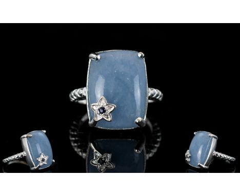 Angelite Statement Ring with sapphire set star accent, 12cts of the unusual stone, angelite, mined in Mexico, in a single elo