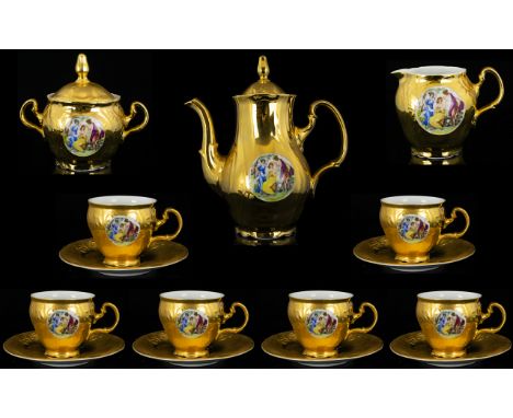 A Czech Gilt Ceramic Coffee Service Fifteen piece service comprising six cups and saucers, coffee pot, milk jug and twin hand