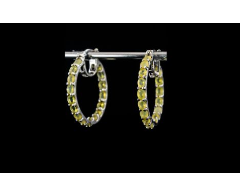 Canary Opal Hoop Earrings, large hoops set with oval cuts of the natural, ethereal yellow opal to the front and the inside ba