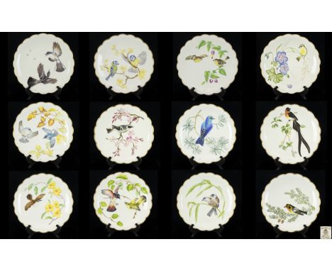 Royal Worcester Hand Painted and Limited Edition Collection of Twelve Annual Cabinet Plates.  Featuring various painted ename