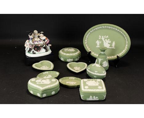 A Mixed Collection Of Wedgwood Green Jasperware To include, trinket dishes, trinket trays, bud vase, covered trinket dishes e