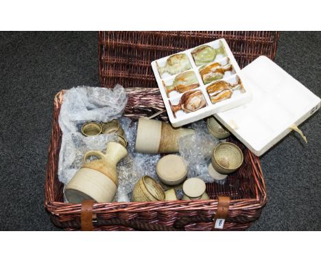 A collection of ceramics in a hamper to include a boxed set of six onyx glasses, and a large collection of stoneware to inclu