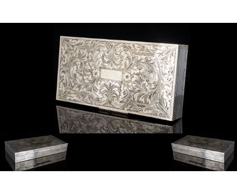 1950's Silver Delux and Stylish Rectangular Shaped Lidded Cigarette Box of Slim Form, with Polished Cedar Wood Interior. The 