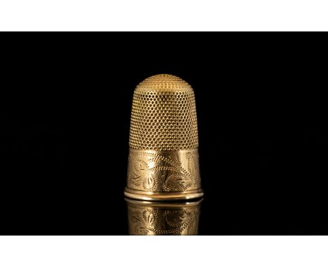 18ct Gold Thimble with Honey Comb Top with Chased Decoration Below. Not Marked but Tests 18ct Gold or Better. 2.9 grams. 