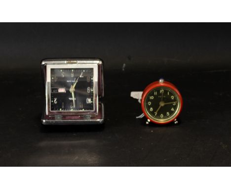 The Ebosa Miniature Alarm Clock Vintage alarm clock complete with original box and instruction manual, red painted finish, sl