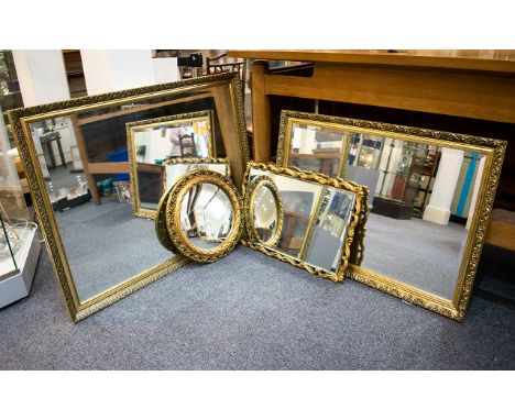 Two Reproduction Gilt Framed Over Mantel Mirrors Large rectangular bevelled glass mirrors, each housed in gilt swept moulded 