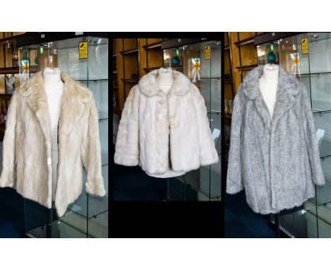 Three Vintage Fur Coats To include one silver grey faux fur jacket with exaggerated shawl collar, blonde faux fur short jacke
