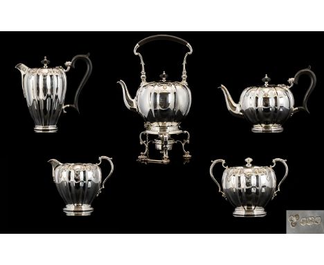 Elizabeth II Wonderful Quality Pumpkin Form Five Piece Silver Tea And Coffee Service Hallmark, Sheffield 1977 Comprising an i