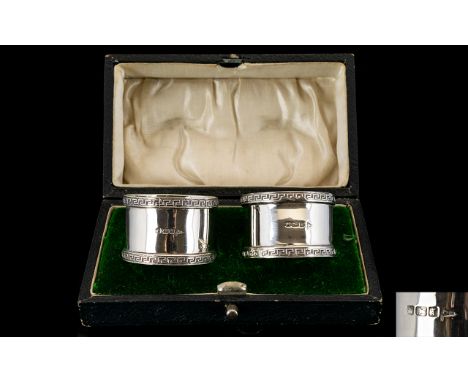 Walker and Hall Boxed Pair of Silver Napkin Holders with Celtic Pattern Banded Borders. Hallmark Sheffield 1915, Maker Walker