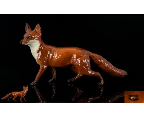 Beswick Ceramic Fox Figure Model number 1016A In red brown and white gloss colourway, issued 1945-1997, designer, Arthur Gred