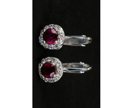 Ruby and White Zircon Clip-On Earrings, a rare appearance of genuine (not converted) clip-on earrings set with round cut rubi