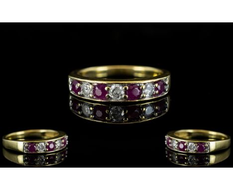 18ct Gold - Attractive and Nice Quality Ruby and Diamond Chanel Set Ring, Both Rubies and Diamonds of Good Colour. Fully Hall