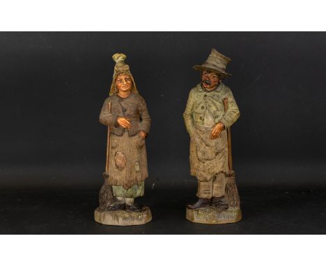 A Pair Of Early 20th Century Continental Ceramic Figures Two painted earthenware figures in the form of male and female peasa
