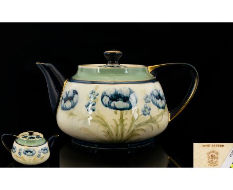 James Macintyre Florian Ware Lidded Teapot ' Blue Poppies ' Pattern. c.1905 - 1908. 4.75 Inches - 11.75 cm High. Gilt Rubbed,