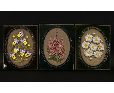 Three Jiegantofta Sweden Floral Ceramic Wall Hanging Plaques Earthenware tiles with raised floral design of daisy, campion an