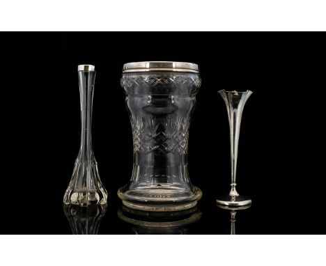 A Cut Glass And Silver Vase Wide trumpet form vase with star base and silver rim, hallmarked, London 'O' 1929. Together with 