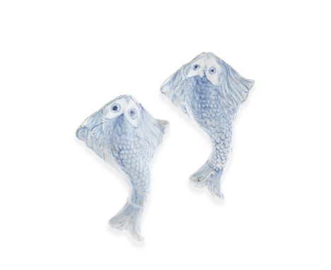 A rare pair of English delftware wall pockets, circa 1760Probably Liverpool, modelled as fish, the scales and fins moulded in