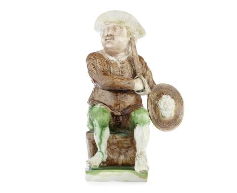 A rare and impressive Wood Family 'Prince Hal' Toby Jug, circa 1785Modelled as a portly figure seated on a rock, head turned 