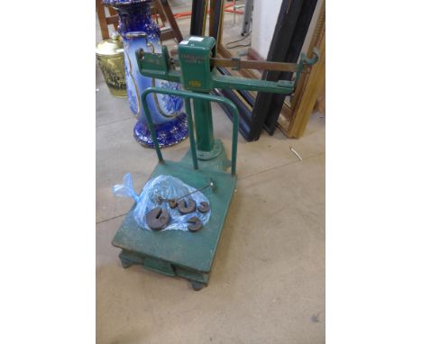 A set of vintage green cast iron H. Fereday &amp; Sons, London weighing scales with weights 