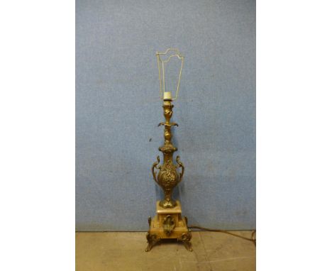 A gilt metal and onyx table lamp 