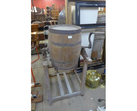 A vintage butter churn on stand 