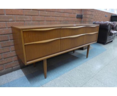 An Austin Suite teak sideboard 