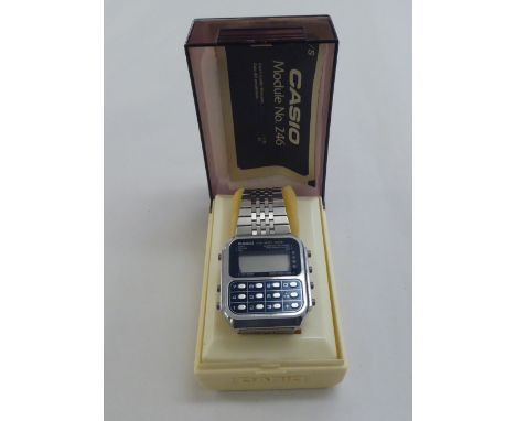 A Casio CA-901 stainless steel cased calculator bracelet watch 