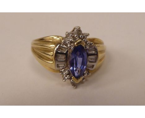 A 10ct gold vintage design ring, set with a blue stone 