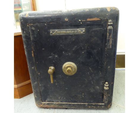 A Griffiths cast iron floor safe&nbsp; 24"h&nbsp; 20"w&nbsp; 16"deep (combination not given)&nbsp; (Our staff cannot assist m