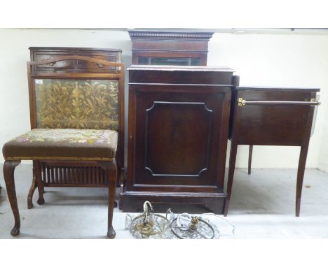 Small 20thC furniture: to include an oak framed 1920s embroidered panel firescreen&nbsp; 34"h&nbsp; 22"w&nbsp; 