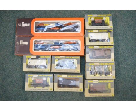 Collection of railway wagons OO gauge, two lima car transporters, Wren railways wagons all new boxed- signs of light use 