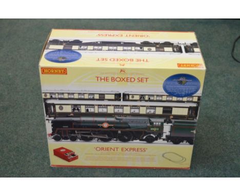 Hornby Orient Express boxed set, containing merchant Navy class locomotive and three Pullman carriages,&nbsp;contains a Lens 