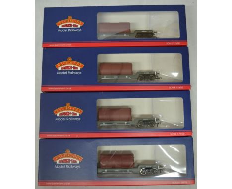 Four boxed Bachmann identical well wagon trailers with boiler, set 33-879A (4) 