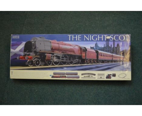 Boxed Marks &amp; Spencer's branded Hornby "The Night Scot" steam engine electric train set, with scenic background and OO ga